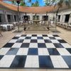 Large chessboard in open patio