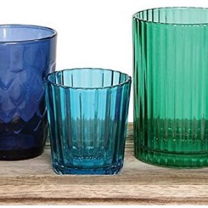 Colorful glassware on a wooden tray
