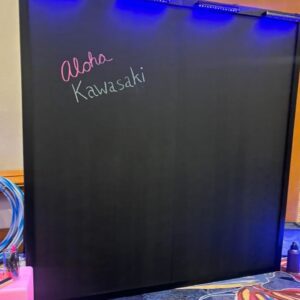 Illuminated blackboard with colorful text