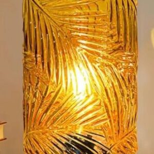 Golden palm-patterned glass lamp