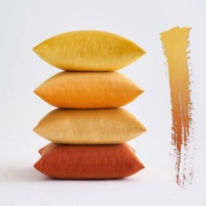 Stacked pillows in warm colors