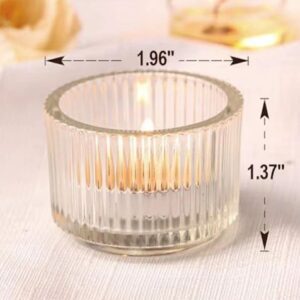 Small candle holder on white cloth