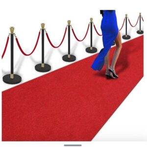 Elegant woman walking on red carpet