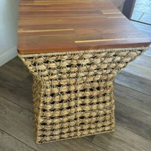 Woven wicker stool with wooden top