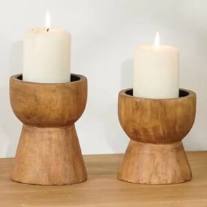 Rustic wooden candle stands with candles