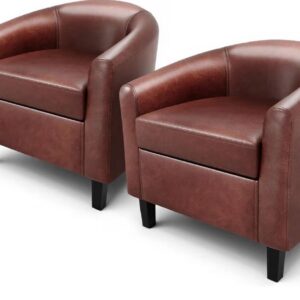 Elegant brown armchairs on white background