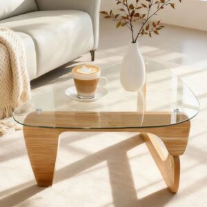 Glass table with coffee and vase