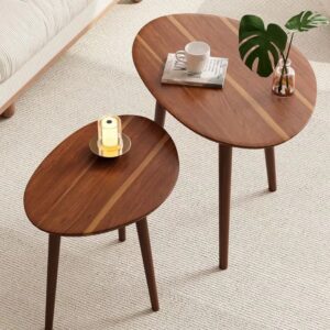Wooden nesting tables with decor