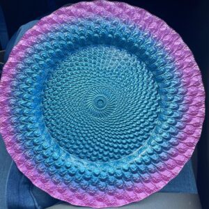 Vibrant plate featuring concentric circular patterns