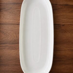 Long white serving plate on wood