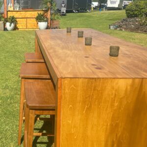 Long wooden table on grass