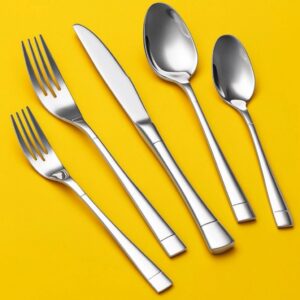 Shiny forks, knives, spoons on display