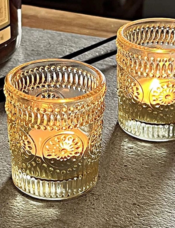 Decorative candles in textured glass holders