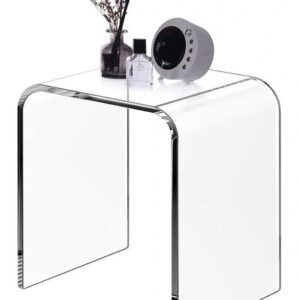 Minimalist clear table with clock and vase