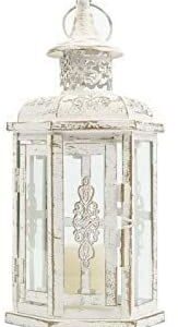 Ornate metal lantern featuring candle inside