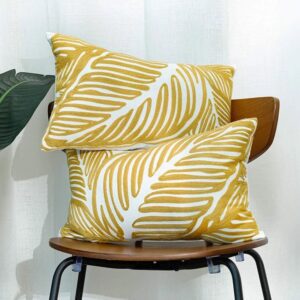 Chair with yellow and white cushions