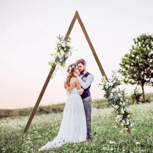 Romantic wedding scene in a field