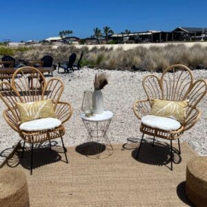 Coastal patio with decorative chairs